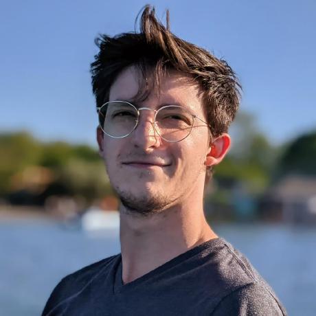 Nicolás Frugoni smiling by the water